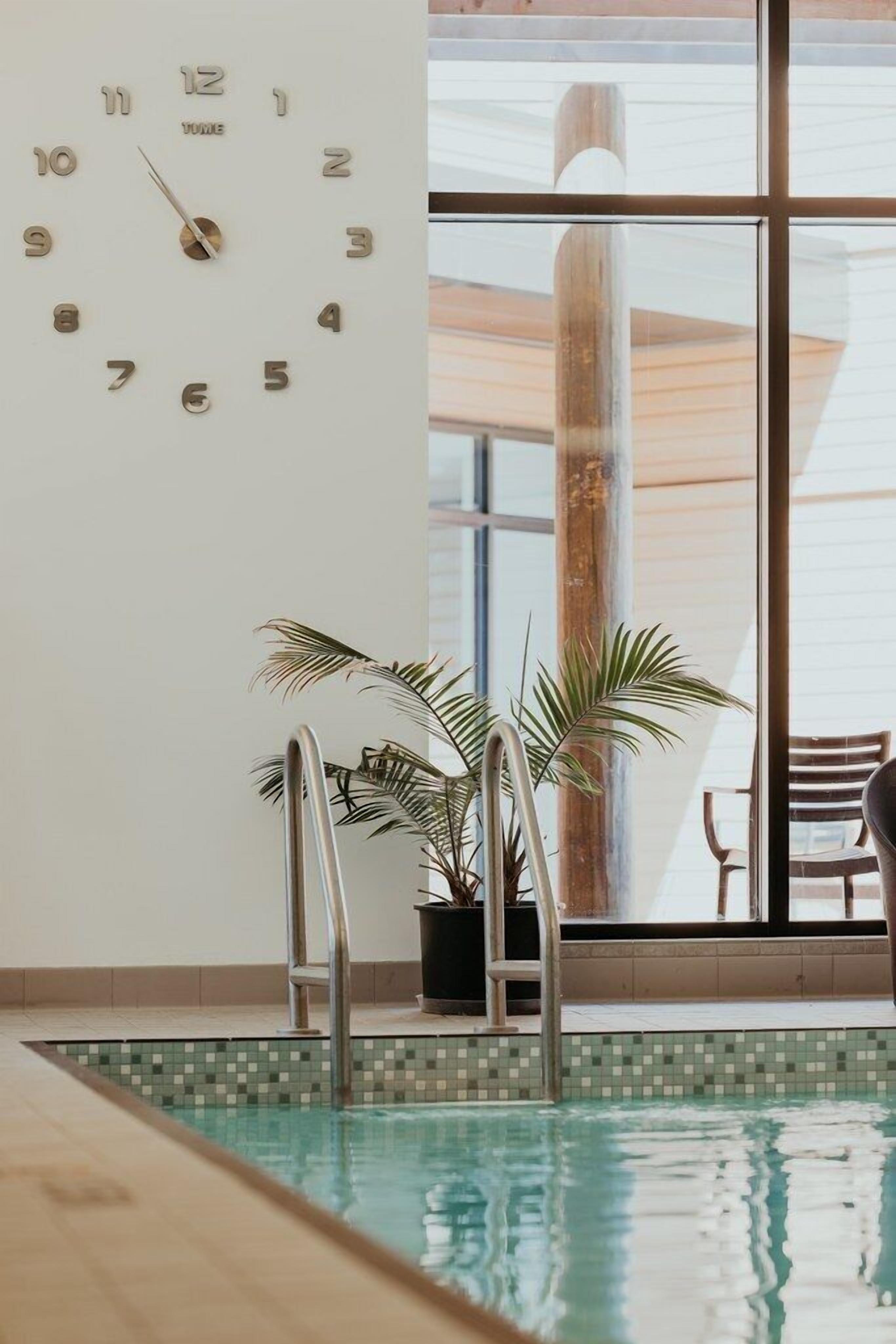 Indoor pool, open 7:00 AM to 9:00 PM, sun loungers