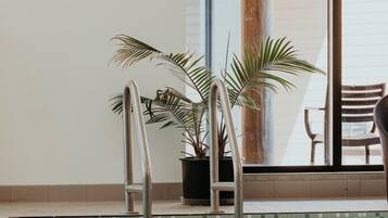 Indoor pool, open 7:00 AM to 9:00 PM, sun loungers