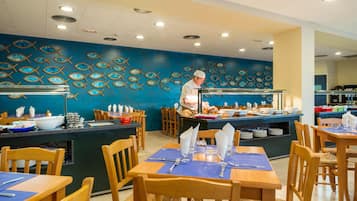 Breakfast, lunch, dinner served; local cuisine
