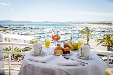 Breakfast, lunch, dinner served; local cuisine