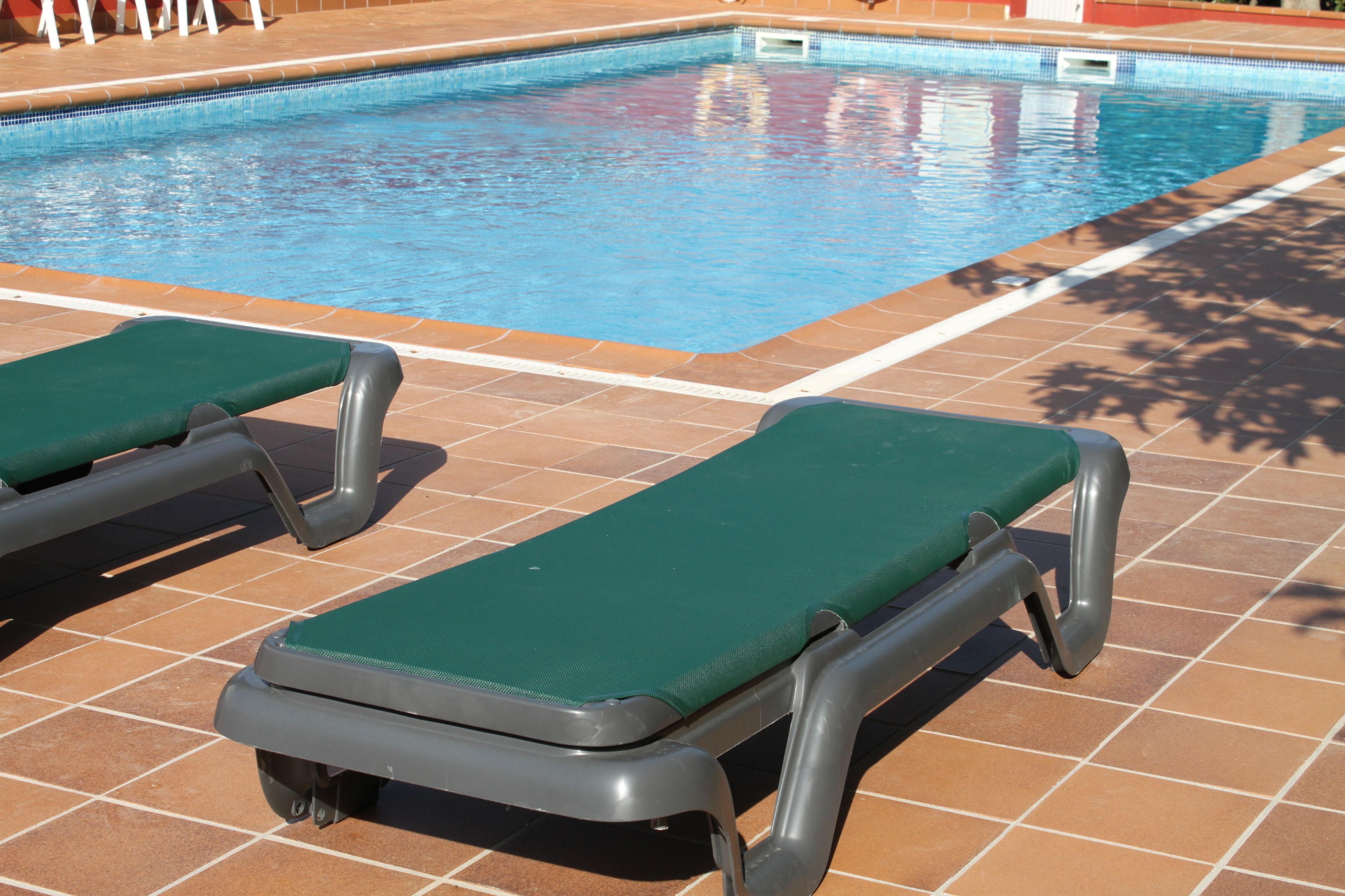 outdoor pool, pool loungers