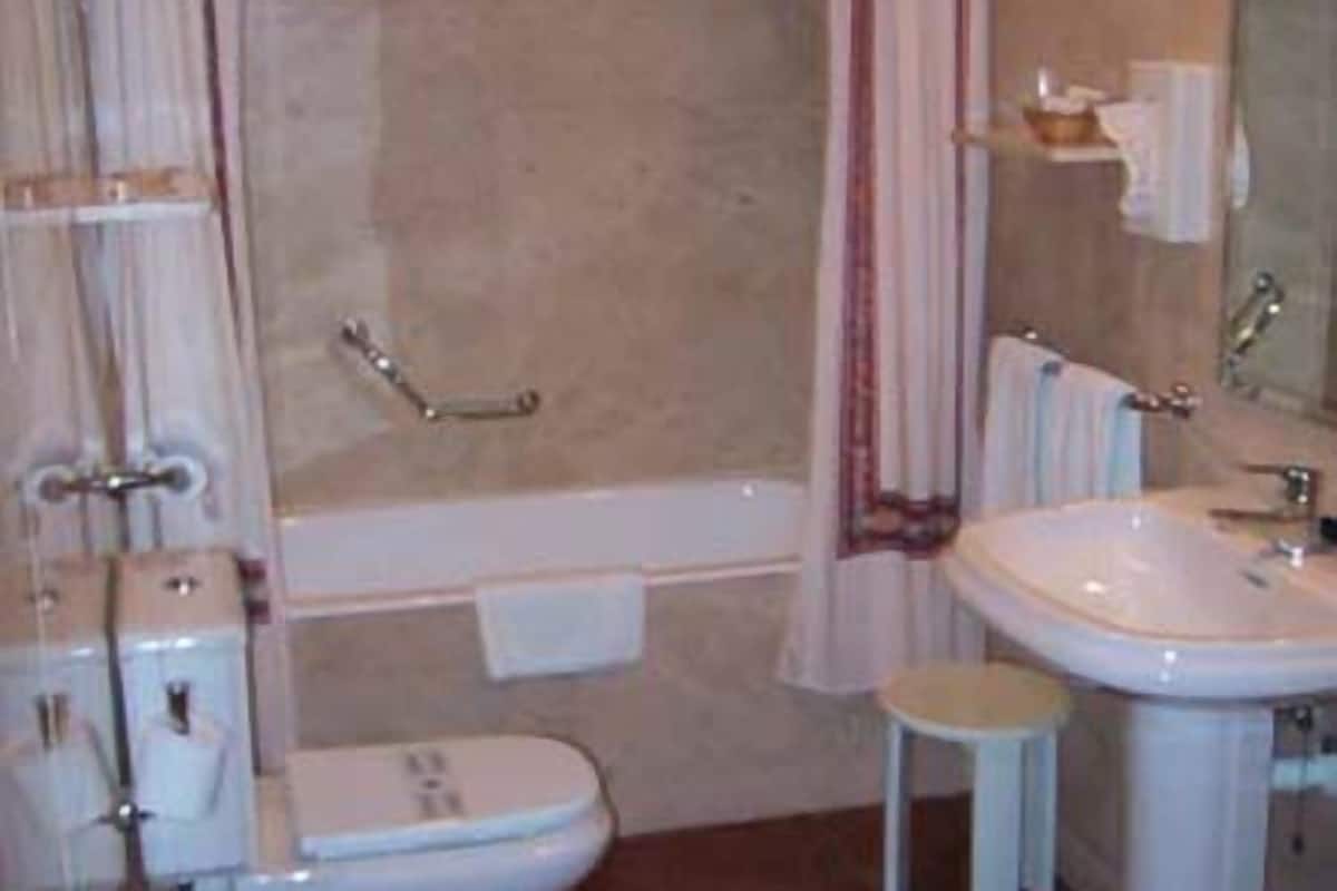 free toiletries, hair dryer, bidet, towels