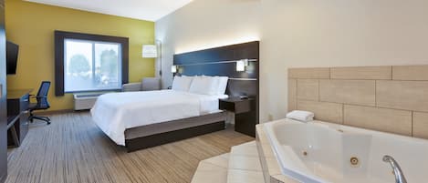 Suite, 1 King Bed (Whirlpool) | 1 bedroom, desk, blackout drapes, iron/ironing board