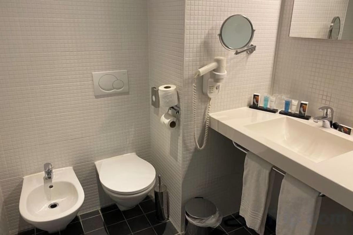 Bathroom | Shower, rainfall showerhead, hair dryer, bidet