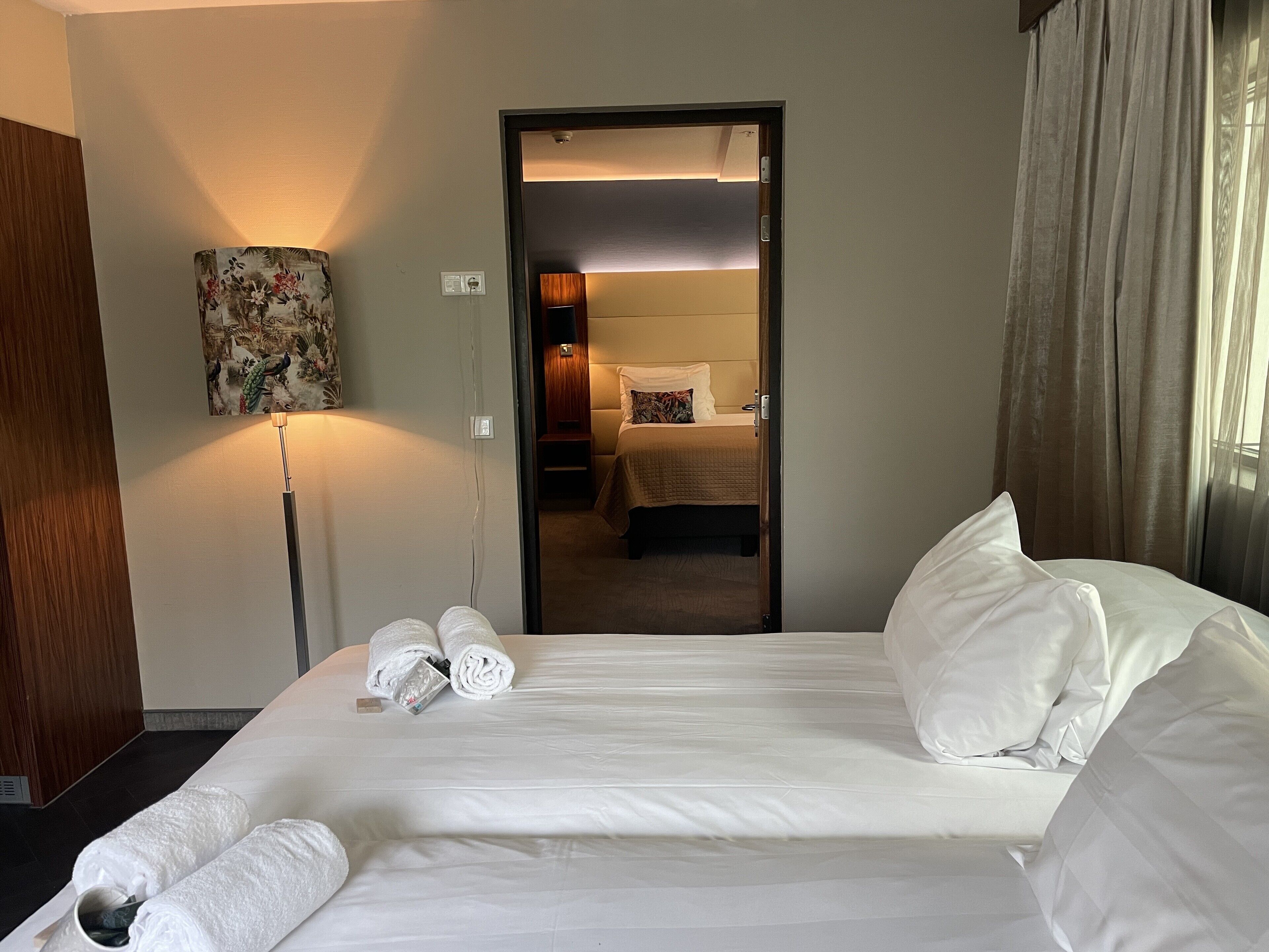 family suite | 1 bedroom, in-room safe, desk, laptop workspace