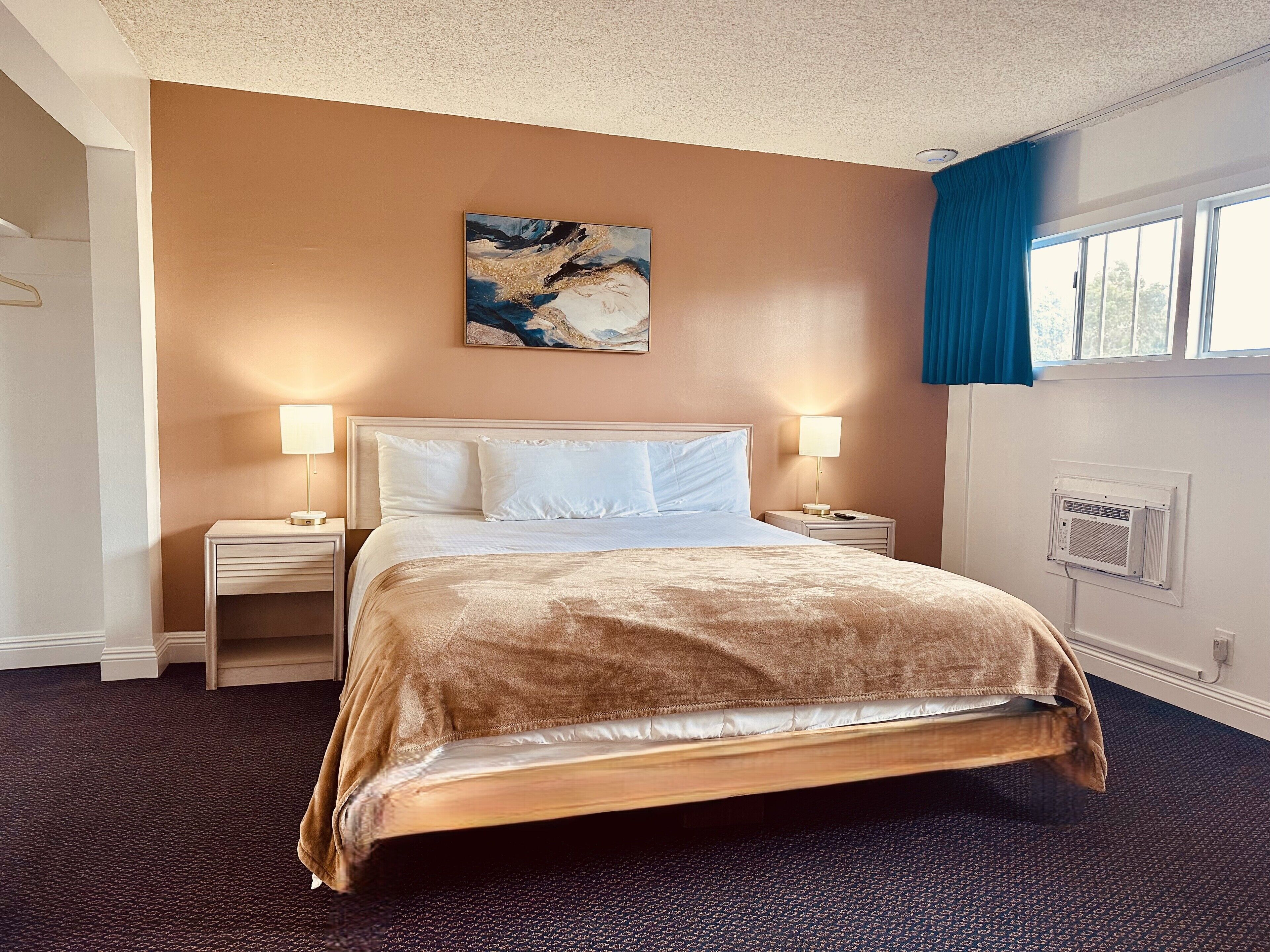 basic room | down duvets, individually decorated, desk, laptop workspace