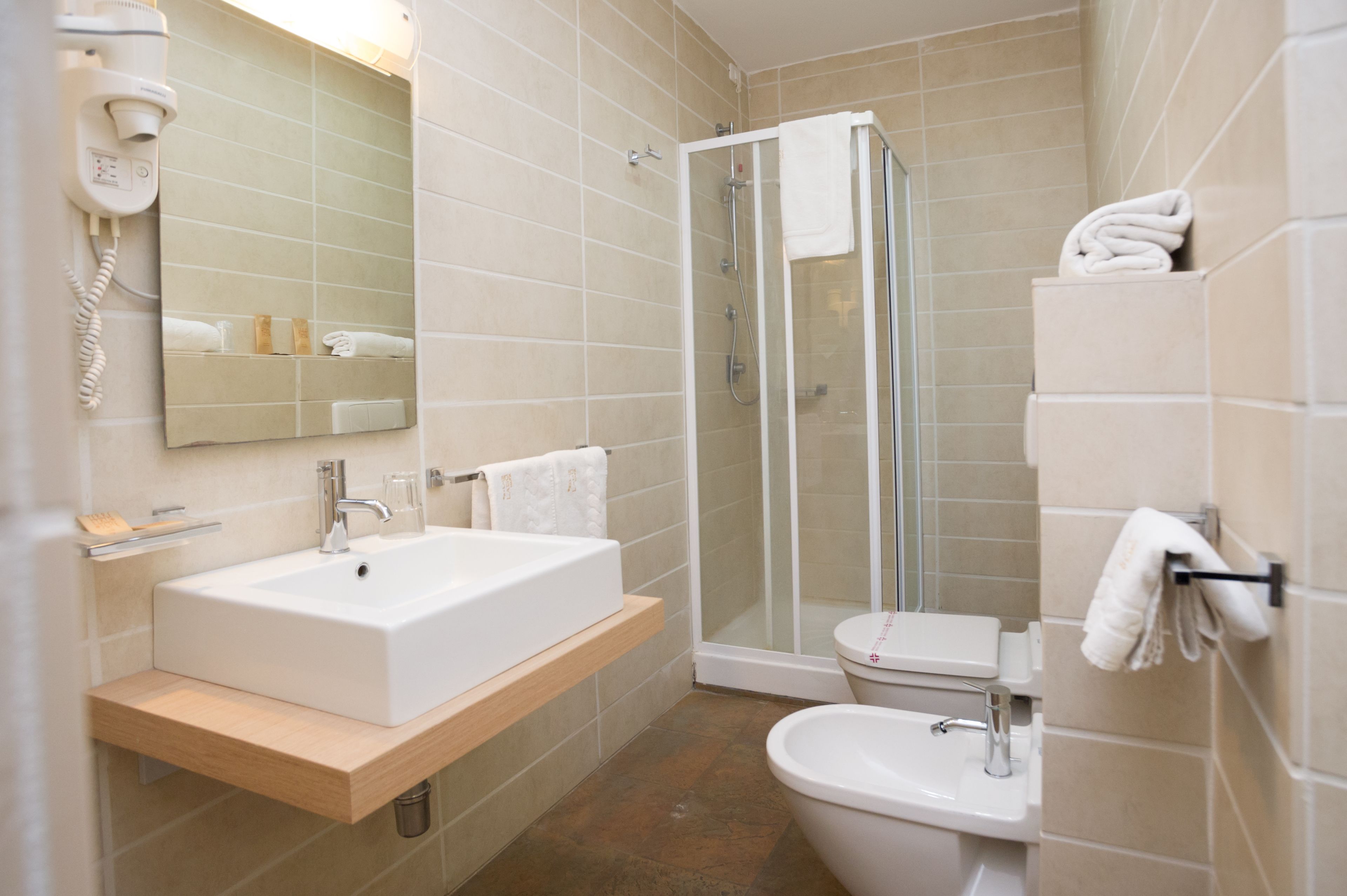 twin room | bathroom | shower, free toiletries, hair dryer, towels