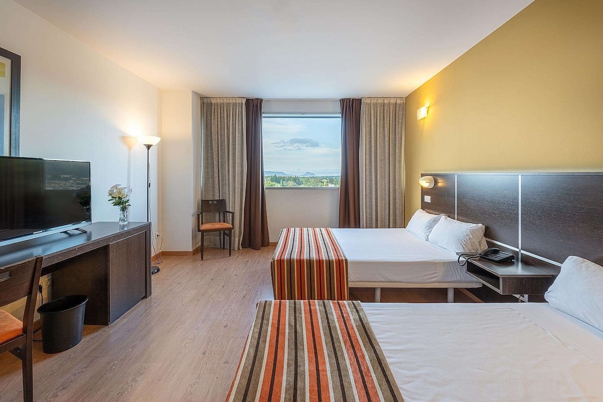 Memory foam beds, minibar, desk, free WiFi