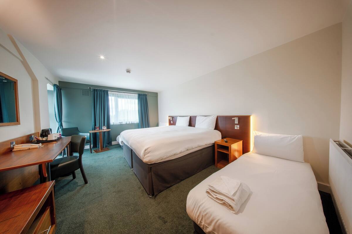 Family Room, Multiple Beds | In-room safe, desk, iron/ironing board, free WiFi