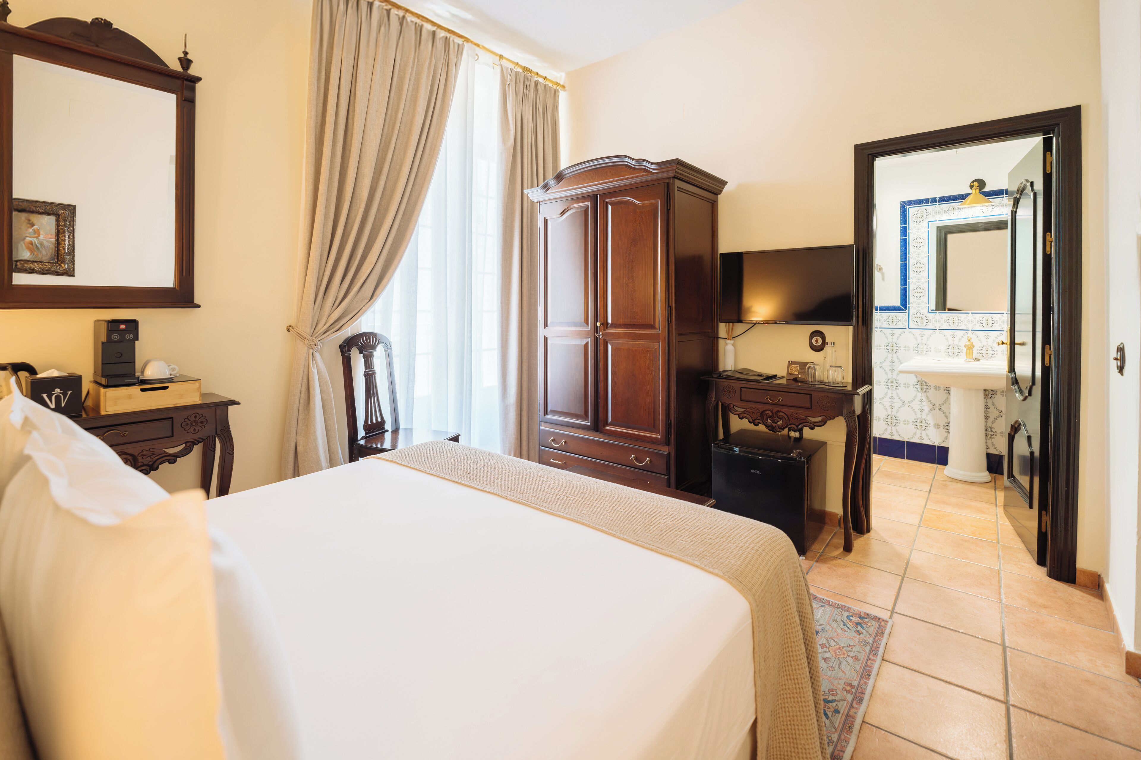 Standard Double Room | Minibar, iron/ironing board, free WiFi