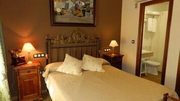 1 quarto, frigobar, cofres nos quartos, escrivaninha