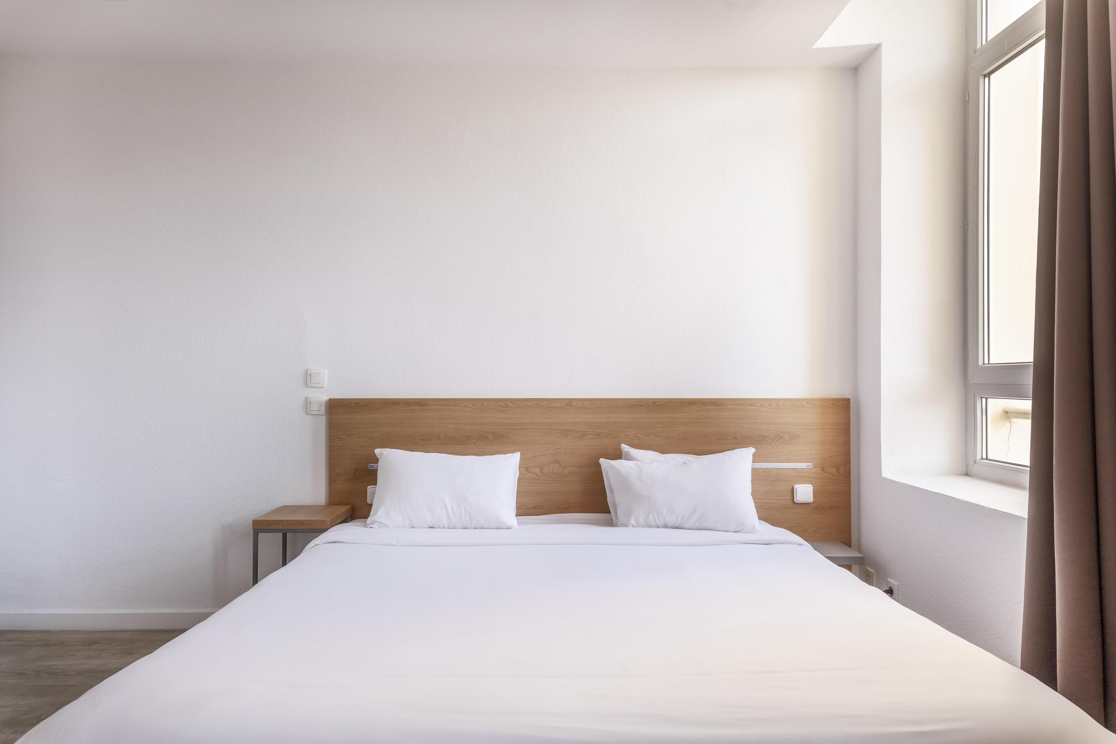 Desk, blackout drapes, soundproofing, iron/ironing board