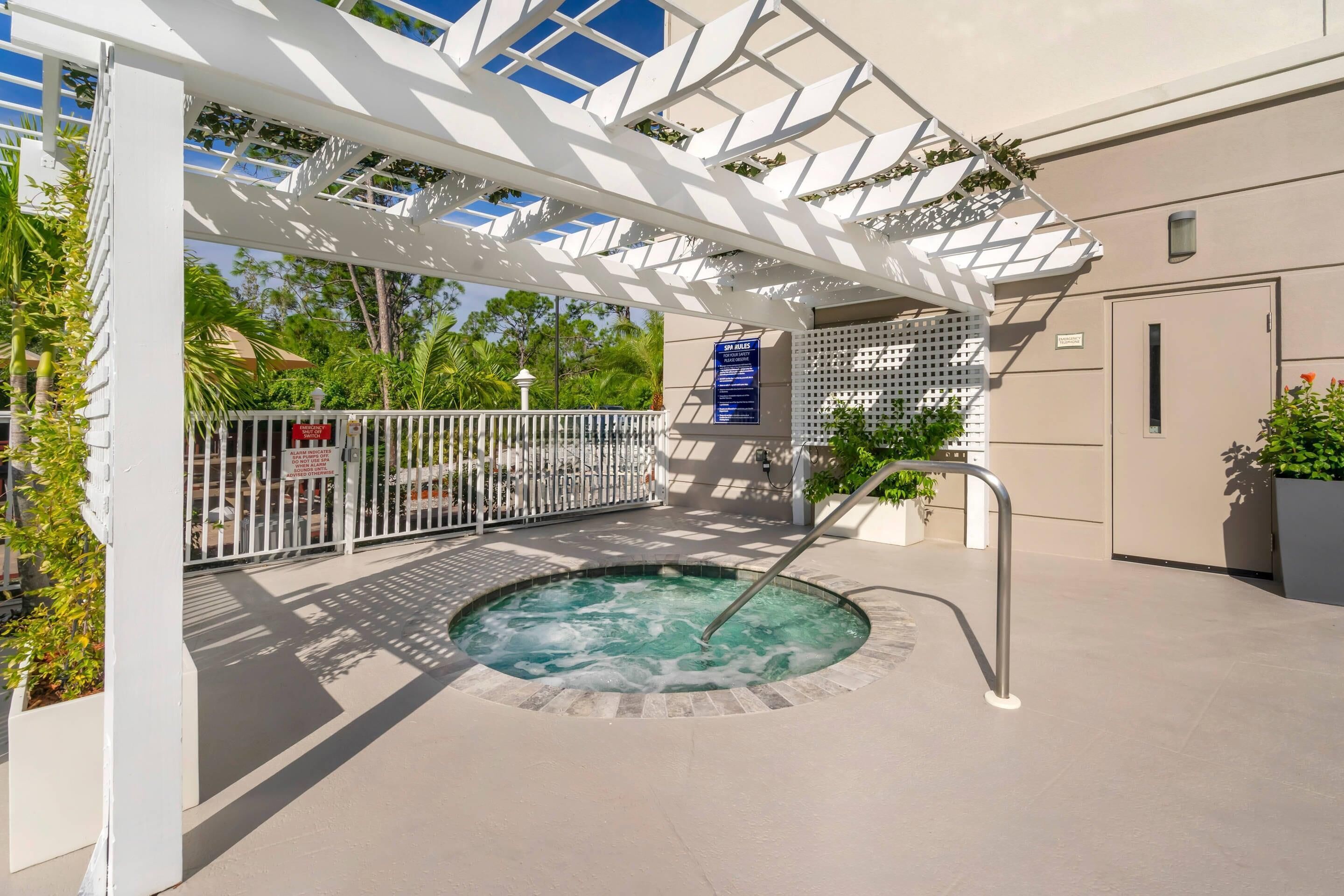 Outdoor pool, open 7:00 AM to 10:00 PM, pool umbrellas, sun loungers