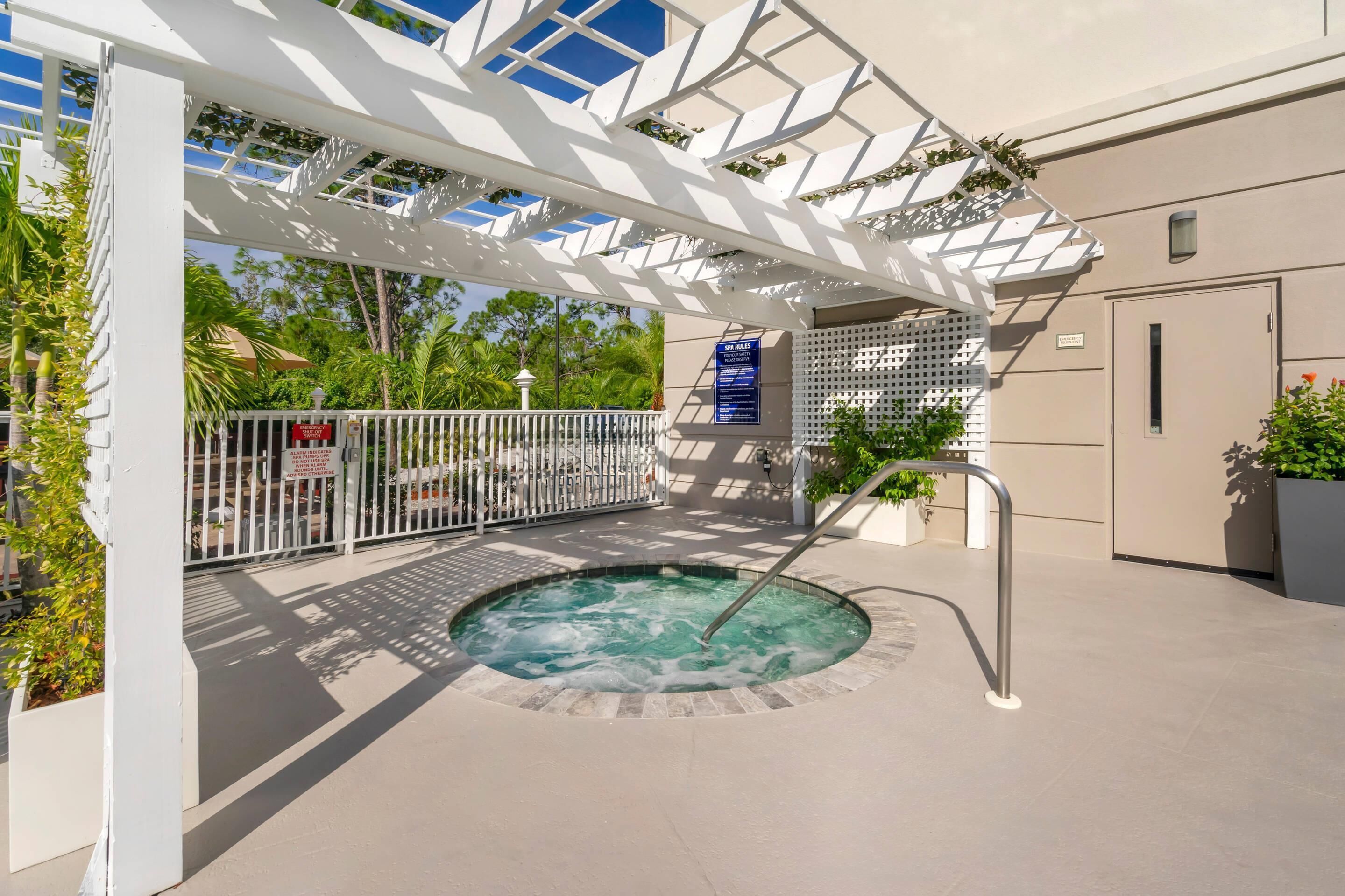 Outdoor pool, open 7:00 AM to 10:00 PM, pool umbrellas, sun loungers