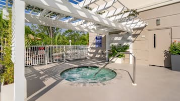 Outdoor pool, open 7:00 AM to 10:00 PM, pool umbrellas, sun loungers
