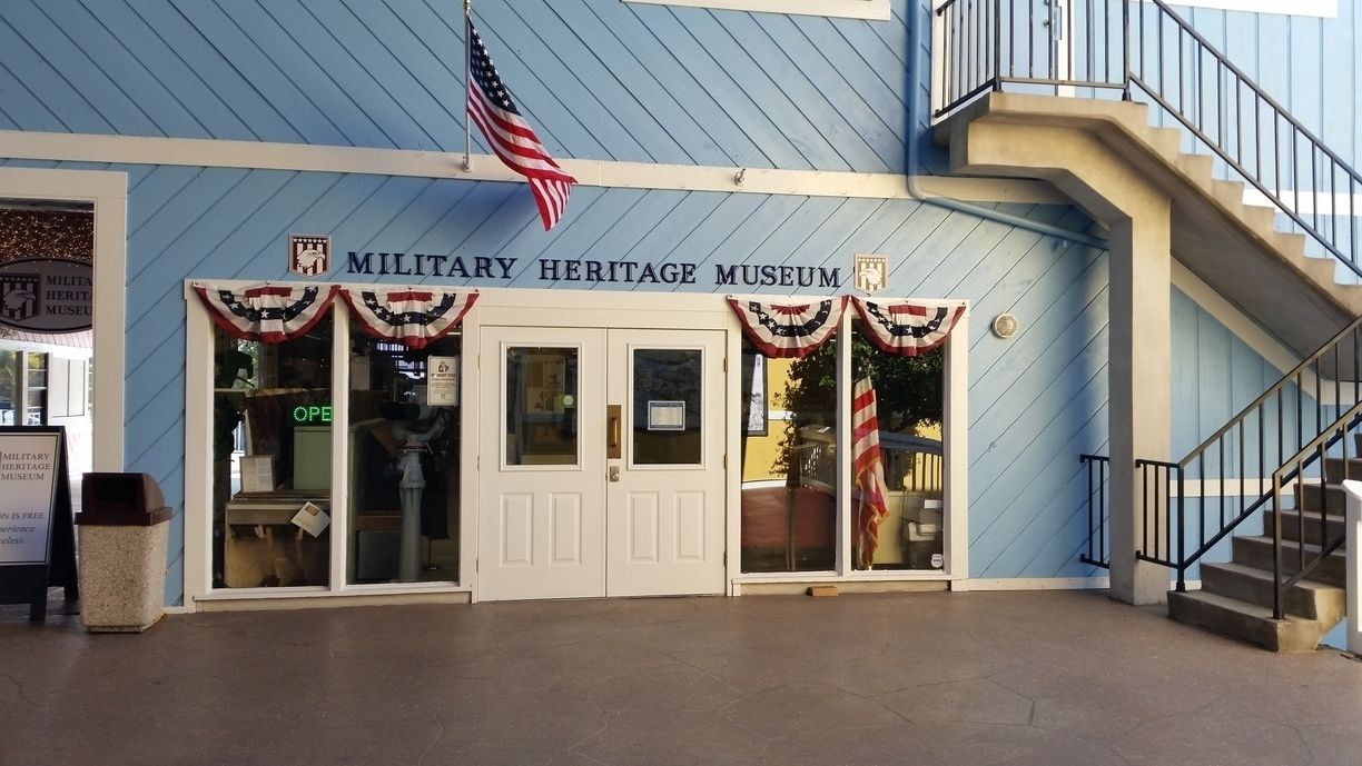 The exterior of the Military Heritage Museum with a staircase leading up to the entrance.