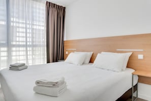 Premium bedding, desk, free WiFi, bed sheets