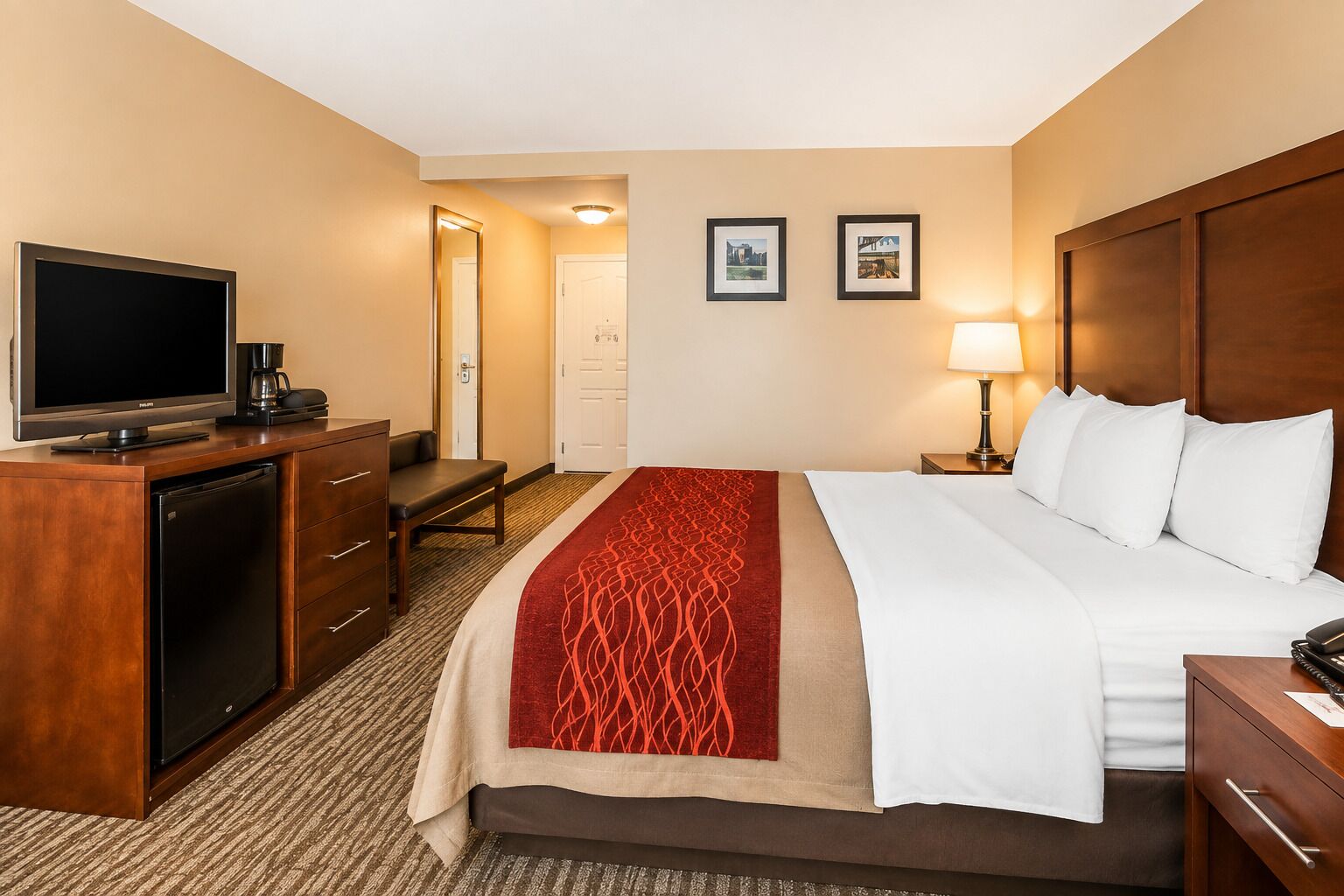 Premium bedding, desk, laptop workspace, blackout curtains