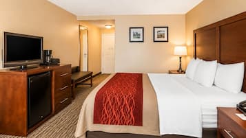 Premium bedding, desk, laptop workspace, blackout curtains