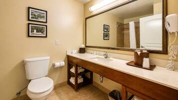 Premium bedding, desk, laptop workspace, blackout curtains