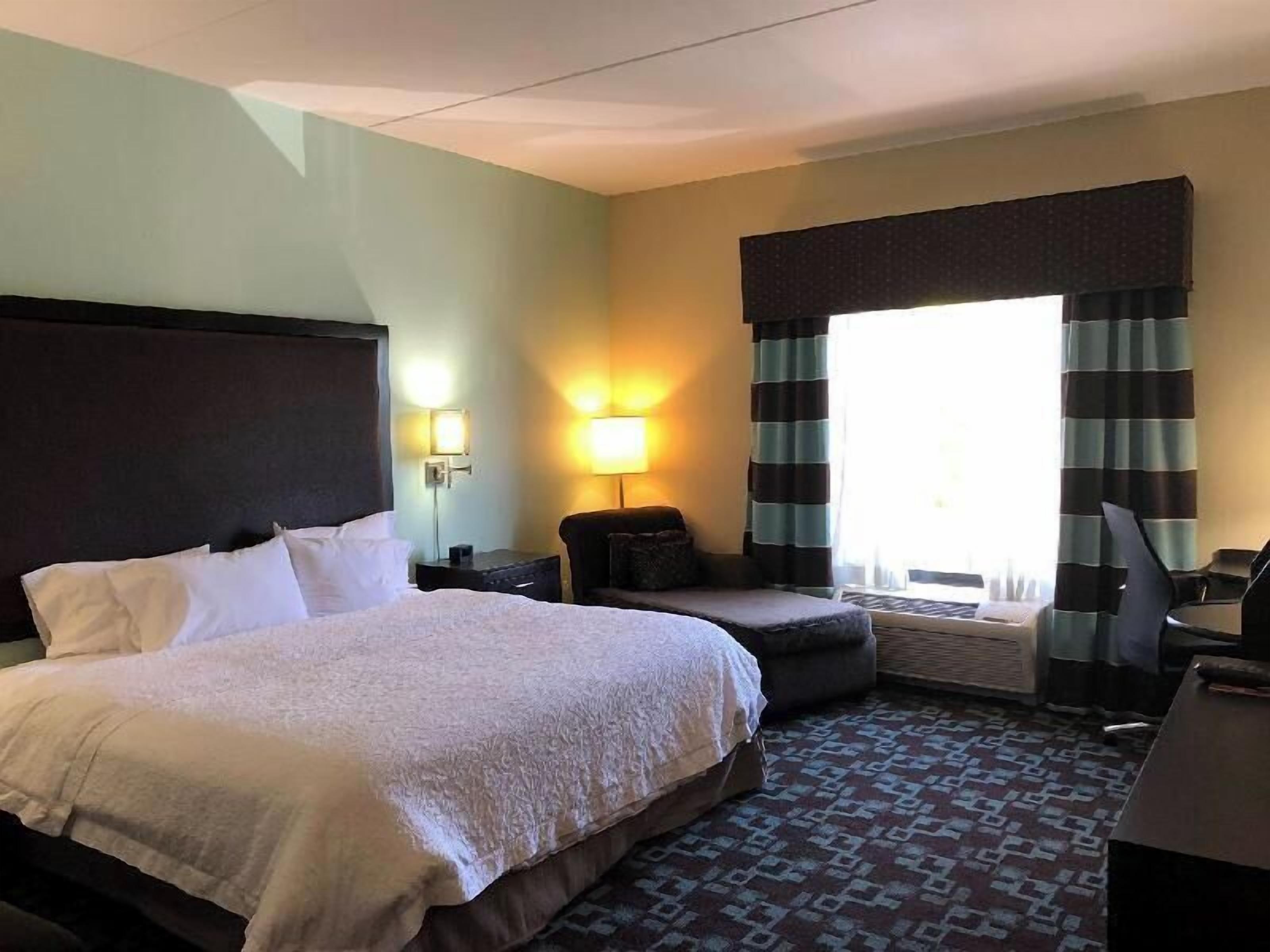 Hypo-allergenic bedding, pillow-top beds, in-room safe