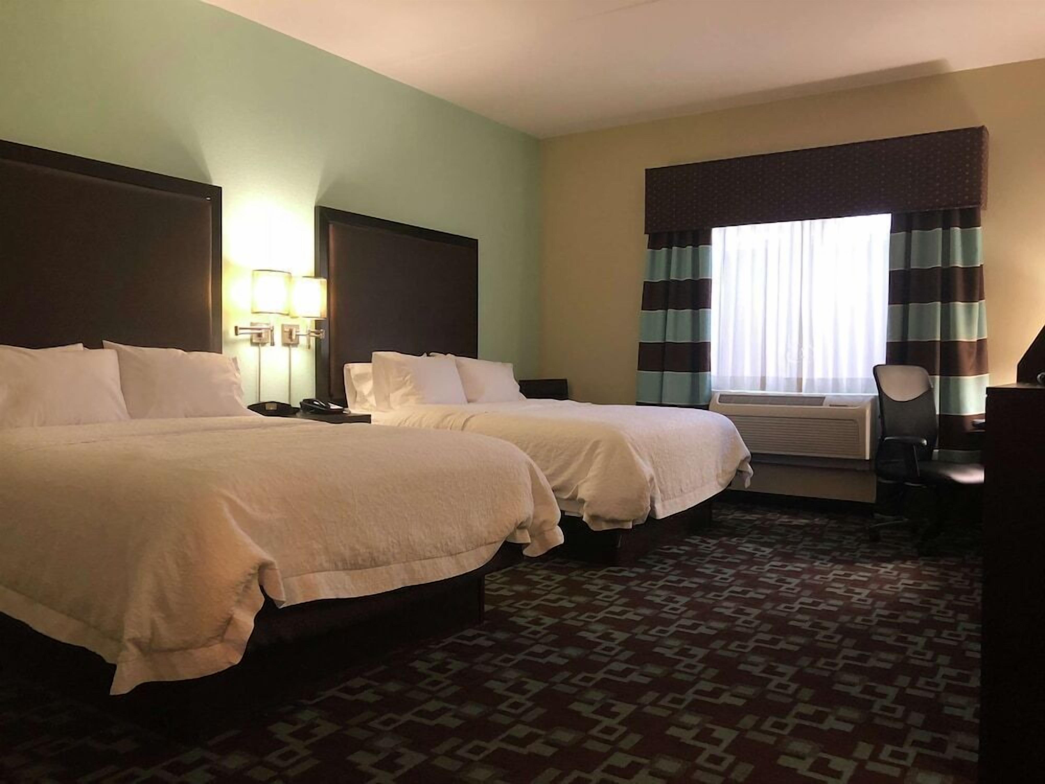Hypo-allergenic bedding, pillow-top beds, in-room safe