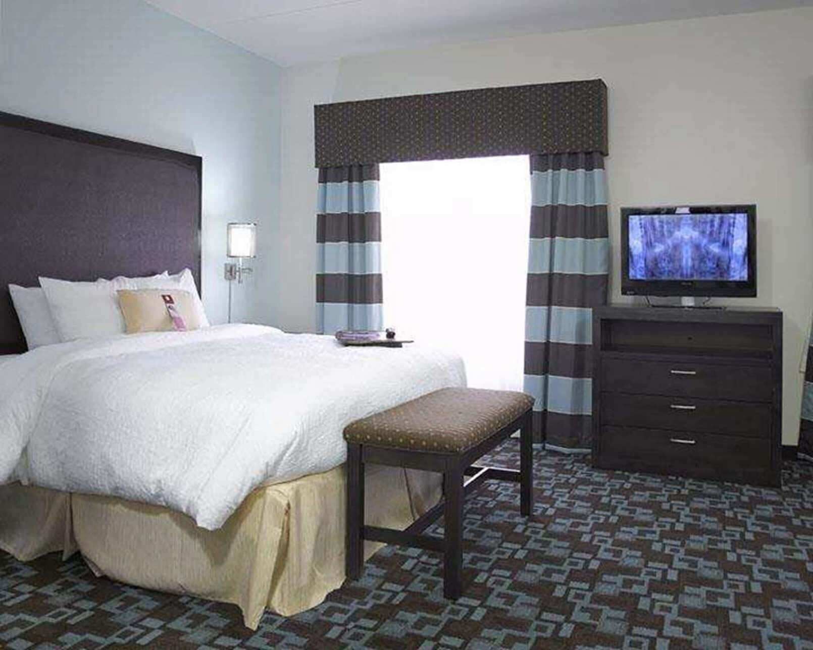Hypo-allergenic bedding, pillow-top beds, in-room safe