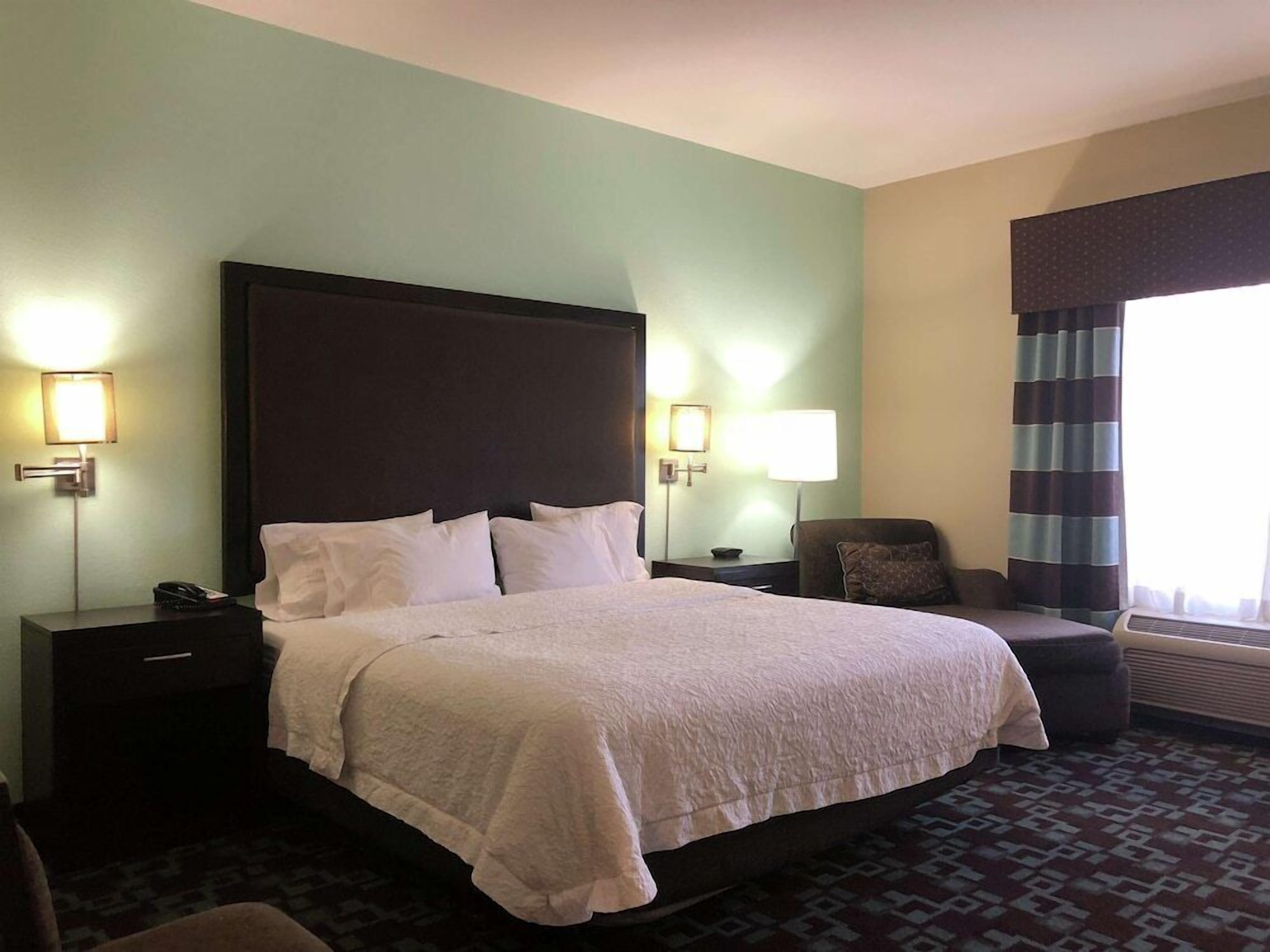 Hypo-allergenic bedding, pillow-top beds, in-room safe