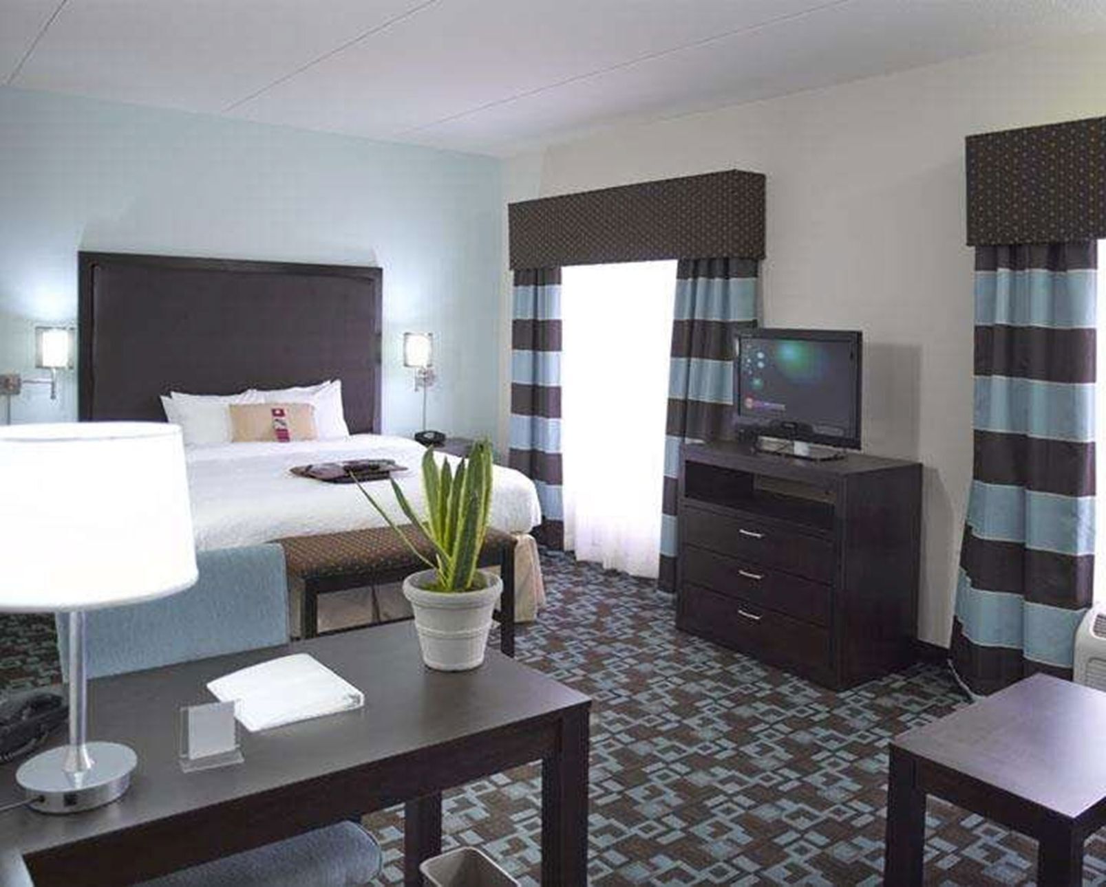 Hypo-allergenic bedding, pillow-top beds, in-room safe