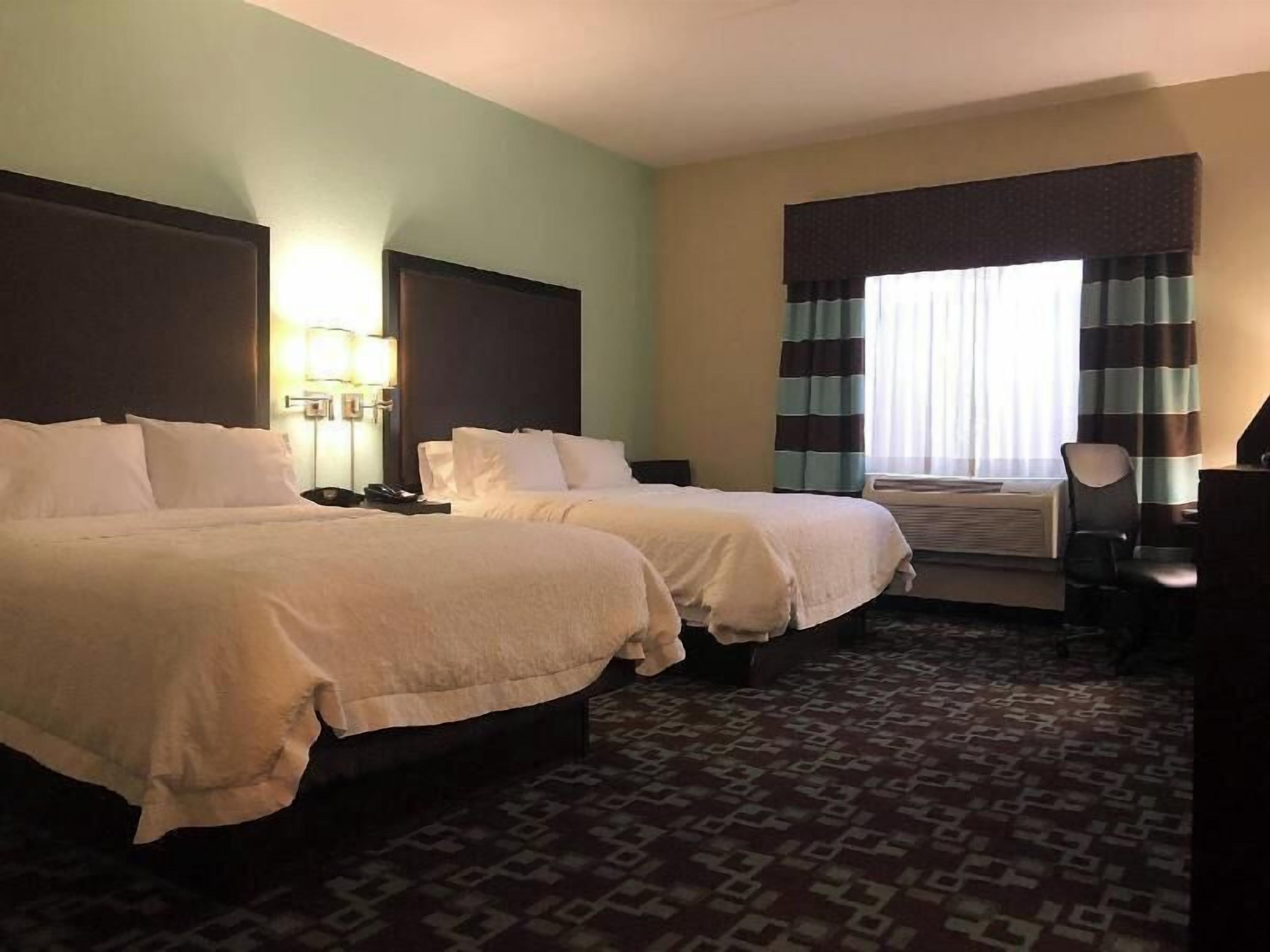 Hypo-allergenic bedding, pillow-top beds, in-room safe