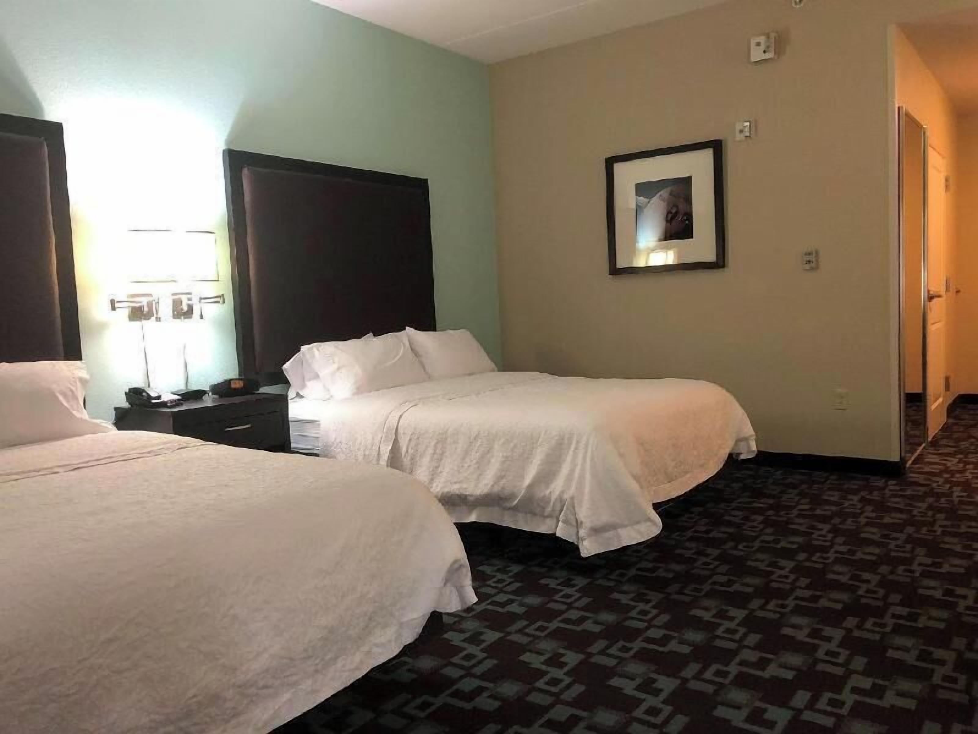 Hypo-allergenic bedding, pillow-top beds, in-room safe