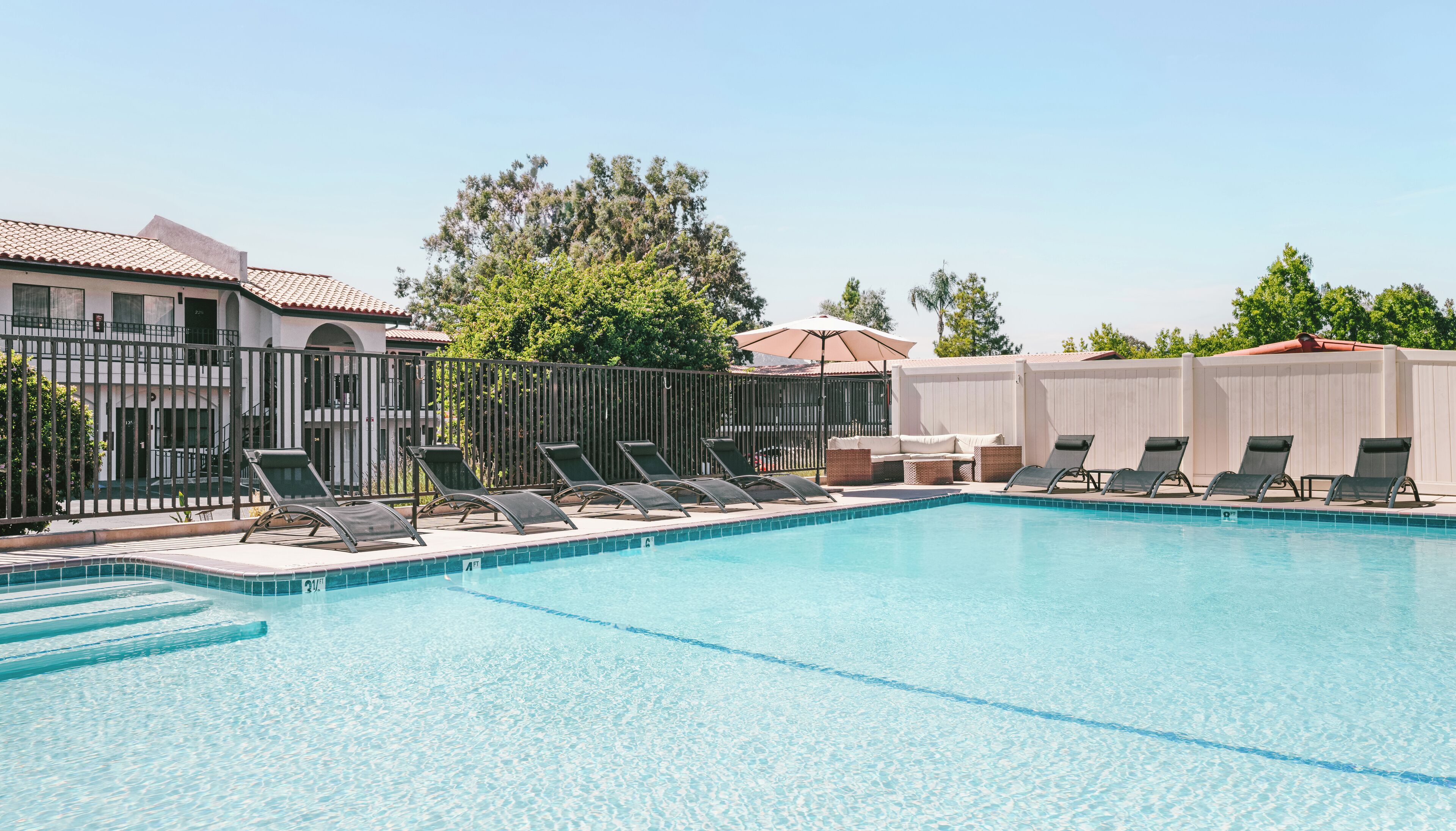 Outdoor pool, open 9:00 AM to 10:00 PM, pool umbrellas, sun loungers