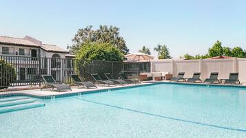 Outdoor pool, open 9:00 AM to 10:00 PM, pool umbrellas, sun loungers