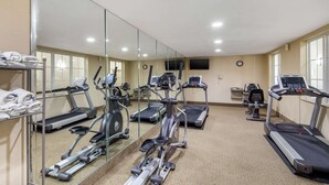 A gym with various exercise equipment, including treadmills, elliptical machines, and a stationary bike. - Comfort Inn & Suites Cedar Hill Duncanville (Cedar Hill)