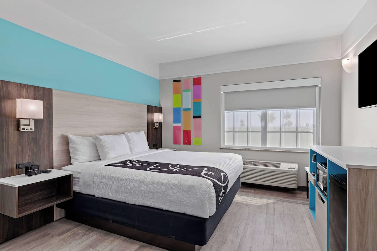 Premium bedding, pillow-top beds, desk, laptop workspace