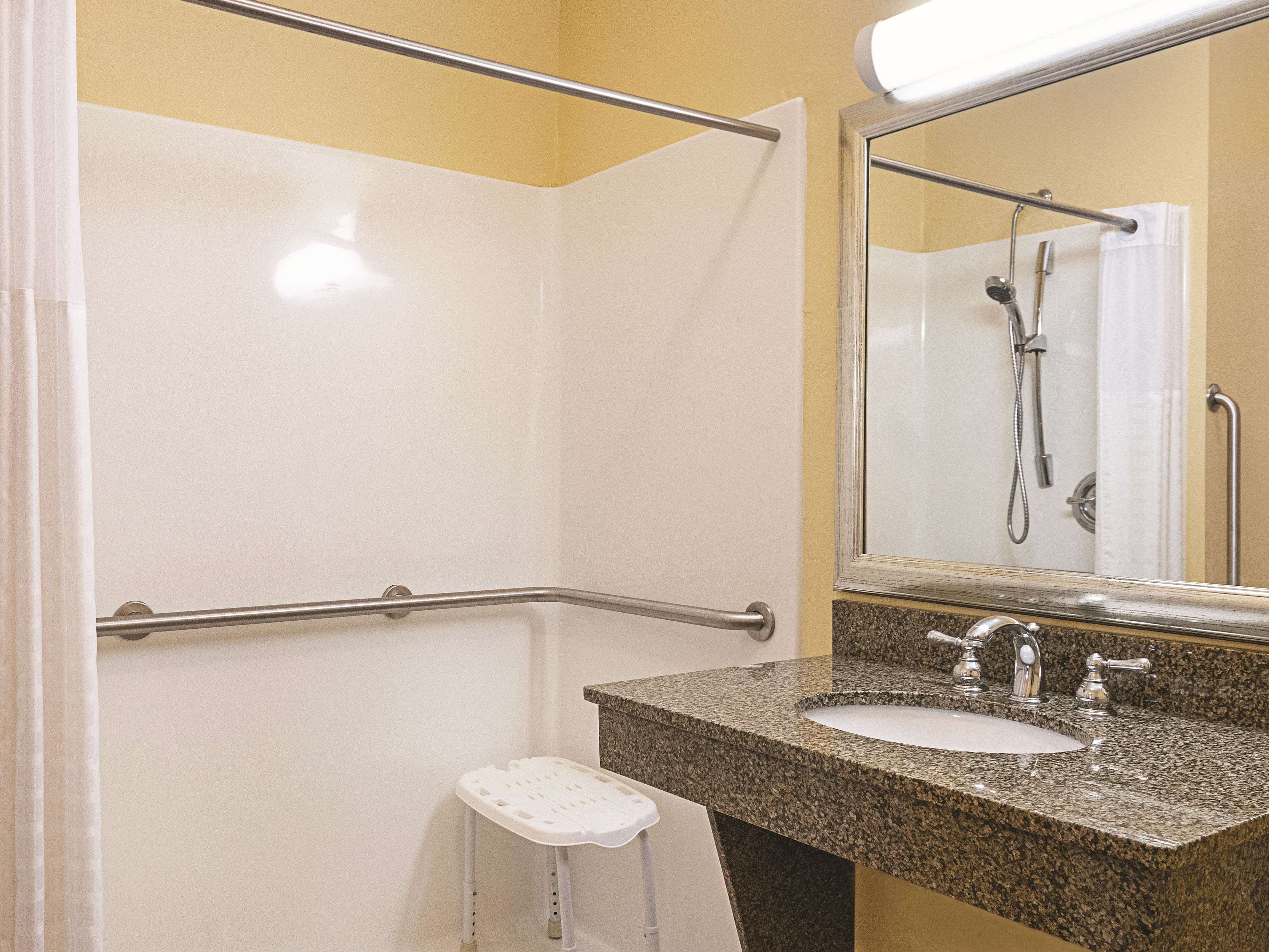 desk, blackout curtains, iron/ironing board, free cots/infant beds