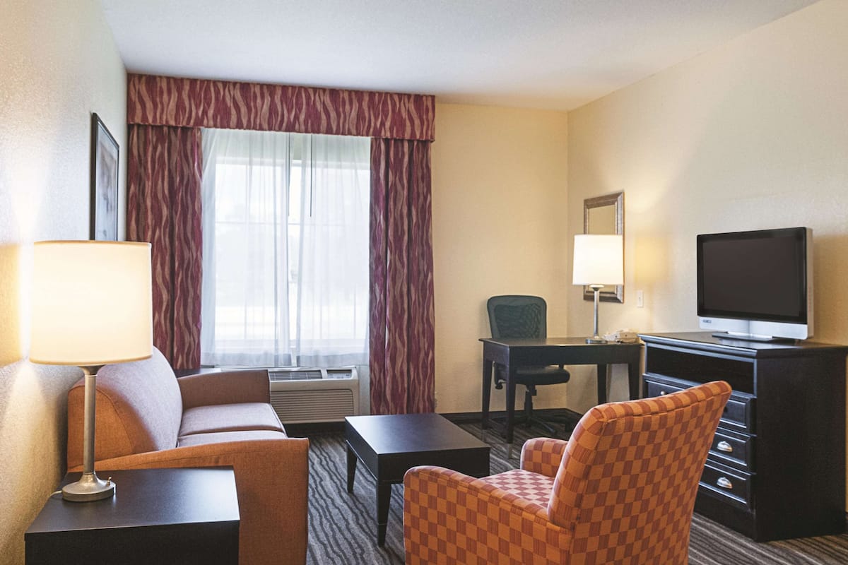 Suite, 1 King Bed, Non Smoking | Desk, blackout drapes, iron/ironing board, free cribs/infant beds