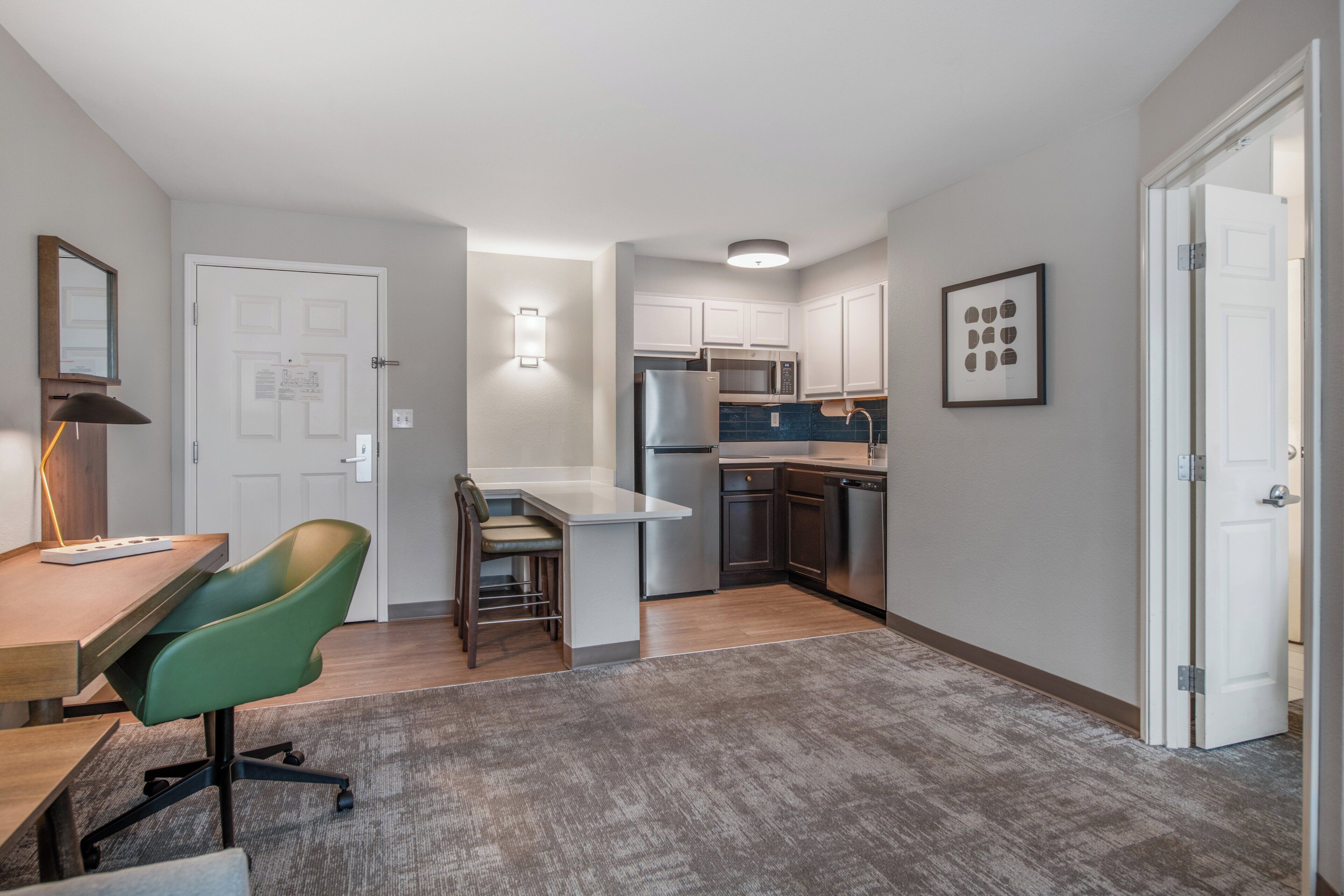 full-sized fridge, microwave, stovetop, dishwasher