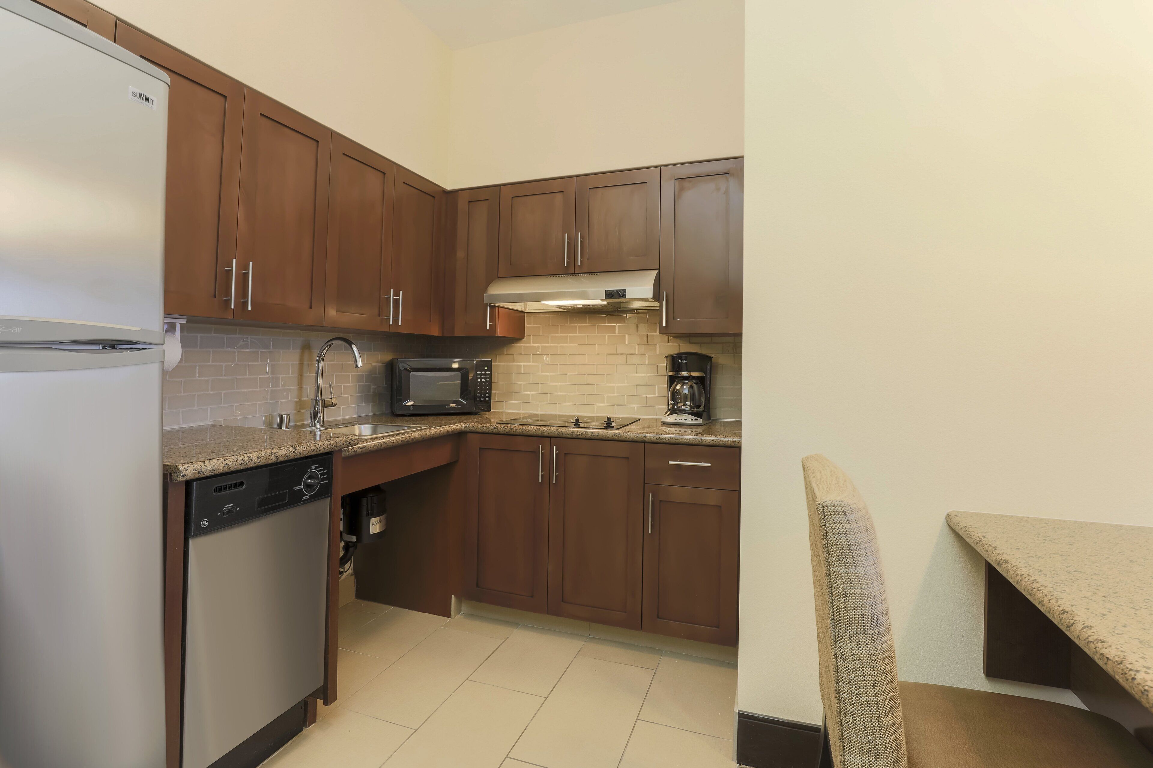 suite, 1 bedroom, mobility accessible, kitchen (roll-in shower) | private kitchenette | full-sized fridge, microwave, stovetop, dishwasher