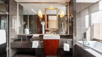 Separate tub and shower, rainfall showerhead, free toiletries