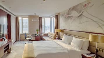 Premium bedding, down duvets, pillow-top beds, minibar
