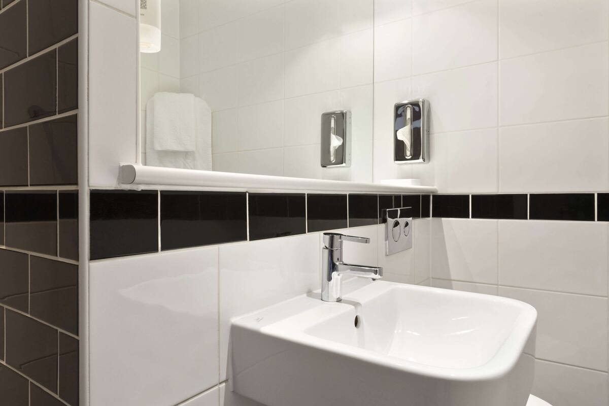 shower, eco-friendly toiletries, hair dryer, towels