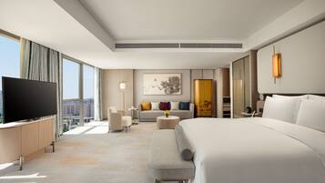 Luxe beddengoed, donsdekens, pillowtop-bedden, een minibar