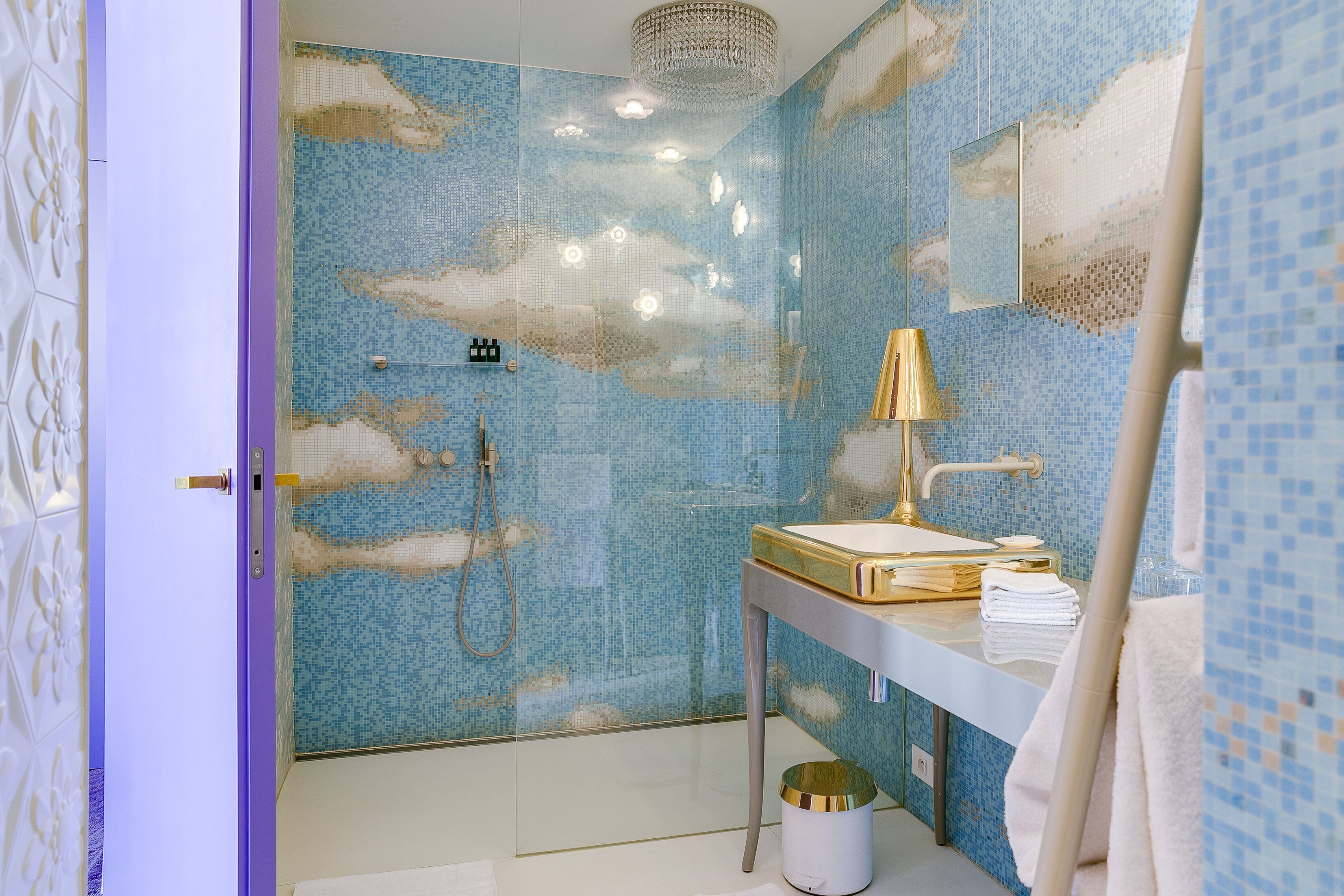 deluxe double room | bathroom | combined shower/bathtub, designer toiletries, hair dryer, bathrobes