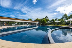 Indoor pool, outdoor pool, pool loungers - Mercure Kooindah Waters Central Coast (Wyong)