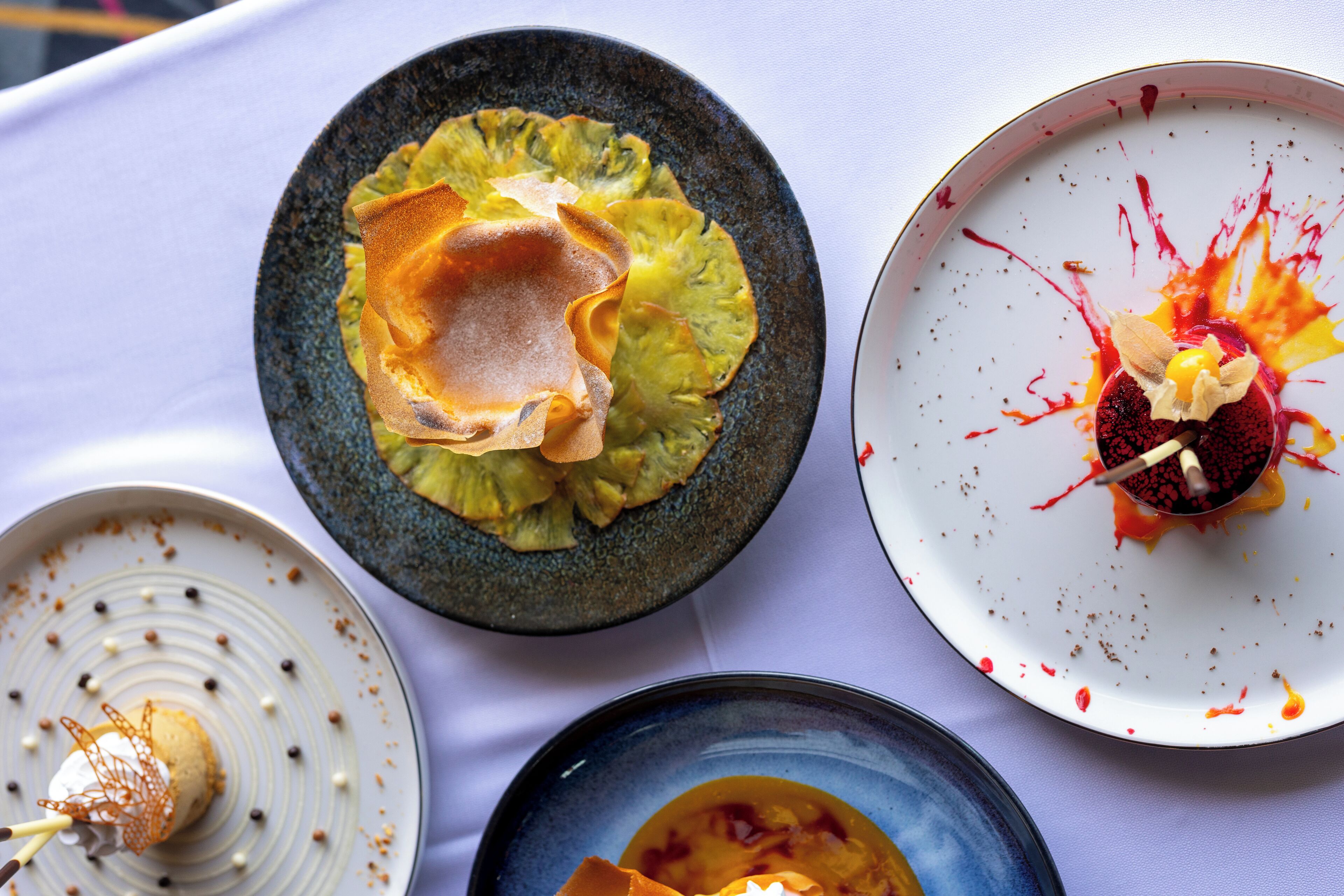 Three plates of food with different presentations.