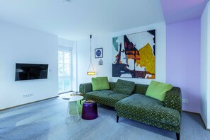 Departamento superior | Área de sala de estar | Televisión de pantalla plana 