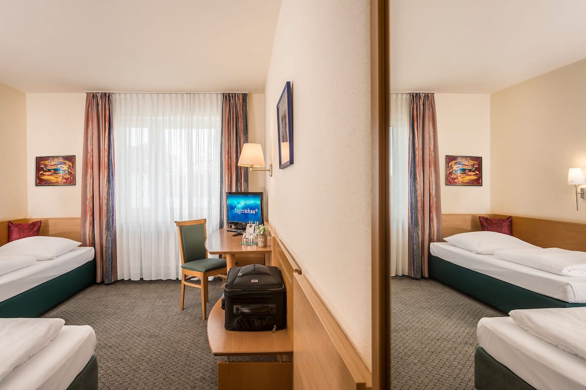 Classic Twin Room | Hypo-allergenic bedding, in-room safe, desk, free WiFi