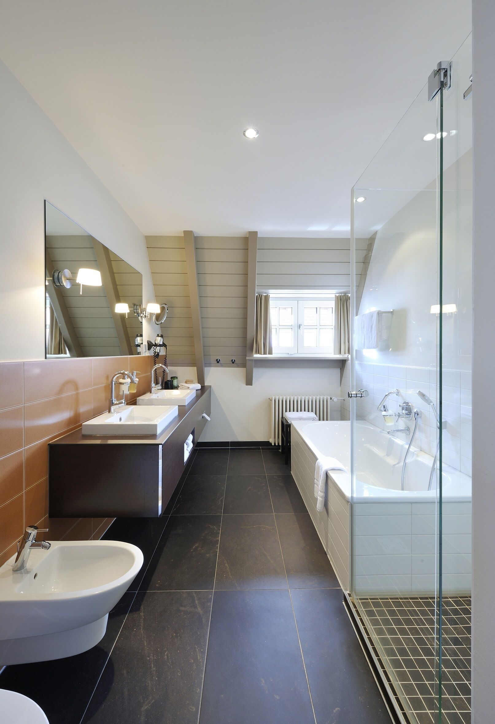maisonette suite with terrace sauna | bathroom | free toiletries, hair dryer, bathrobes, towels