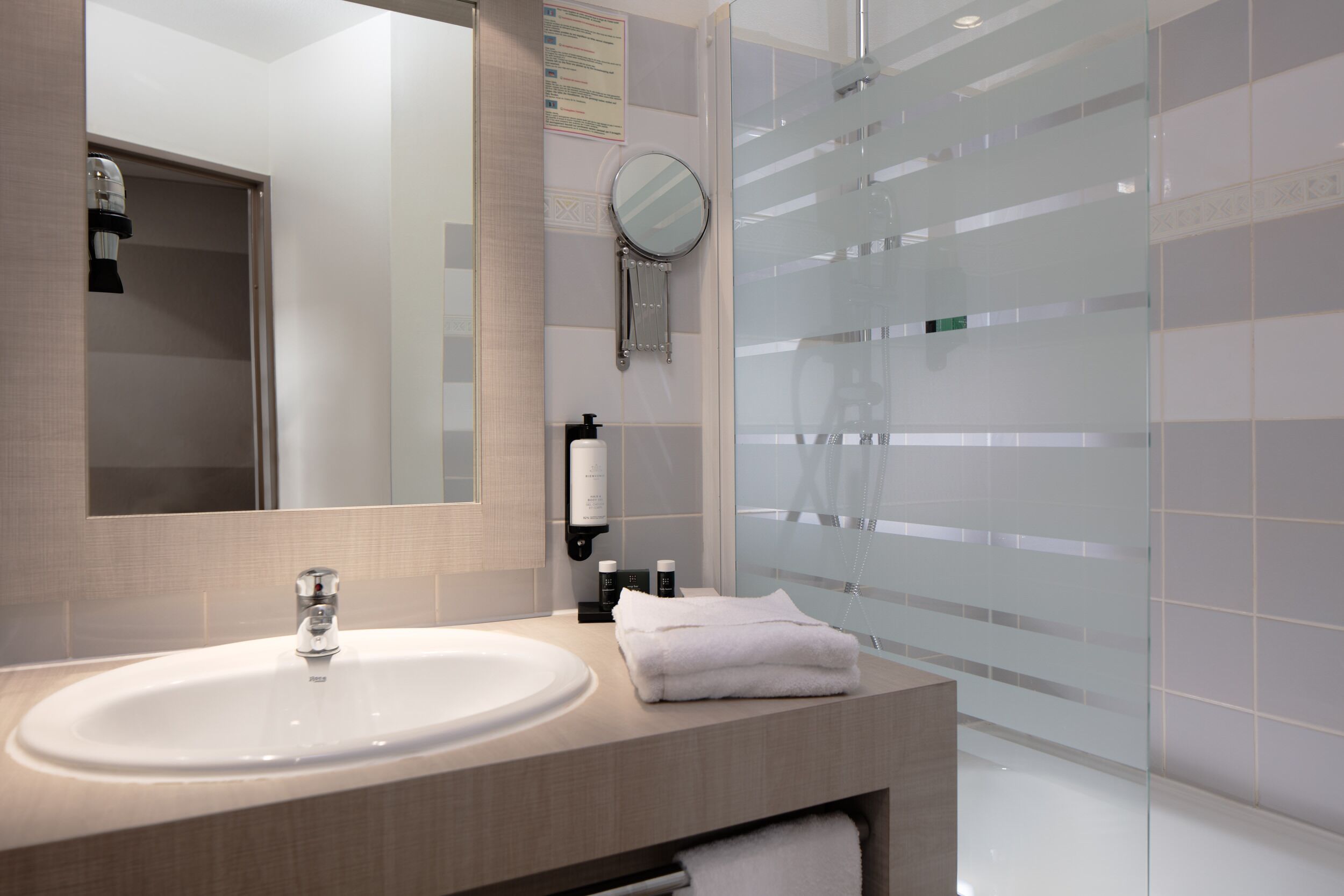 double studio | bathroom | rainfall showerhead, eco-friendly toiletries, hair dryer, towels
